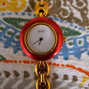 Gucci gold chain link watch
